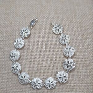 Elegant White Gold Sand Dollar Bracelet